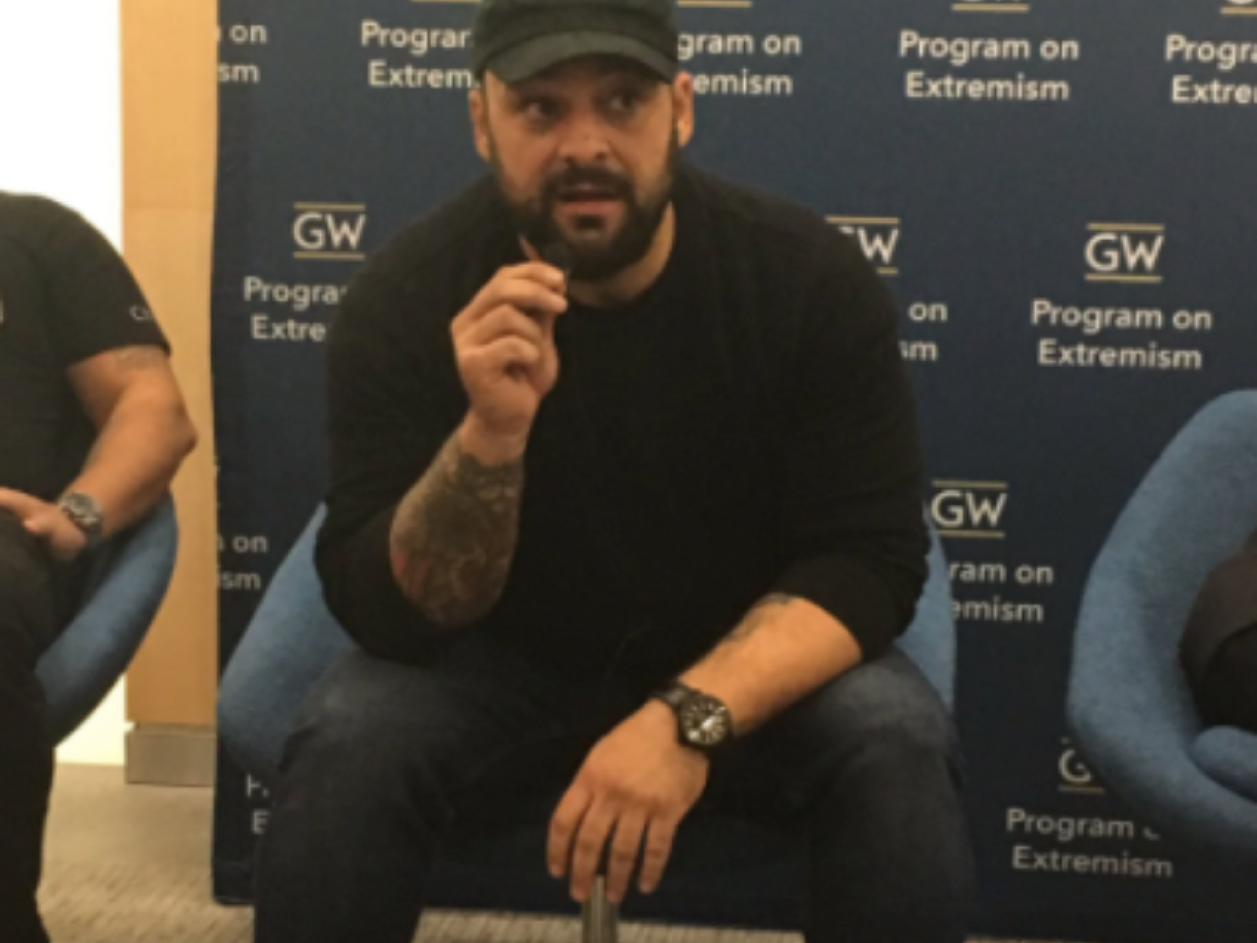 An image of Christian Picciolini, a former skinhead on the panel Fighting the Flames: A Conversation With Former Members of Violent Organization.