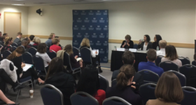 An image of the audience and panel at Women in Terrorism: A Year After San Bernardino.